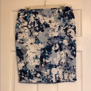Size 8 floral skirt. Zips in back.